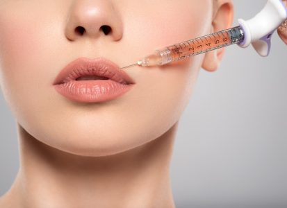 woman-getting-cosmetic-injection-of-botox-in-lips-closeup-.jpg